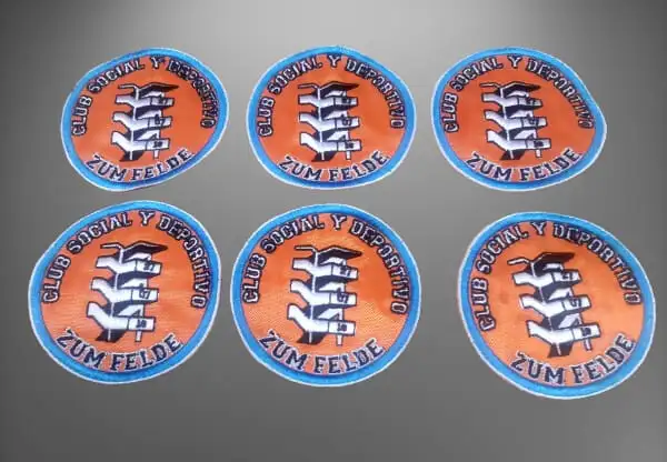 Seis parches bordados naranjas y celestes del Club Social y Deportivo Zum Felde